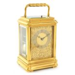 ALFRED BAVEUX. A 19TH CENTURY OVERSIZED GILT BRASS GORGE CASE REPEATING CARRIAGE CLOCK