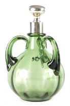 A LATE 19TH CENTURY SILVER MOUNTED GREEN GLASS THREE HANDLED CARAFE