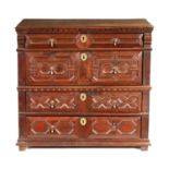 A 17TH CENTURY GEOMETRIC FRONTED JOINED OAK CHEST