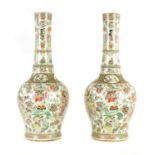 A PAIR OF 19TH CENTURY FAMILLE VERTE CHINESE CANTON SLENDER NECK SHOULDERED VASES