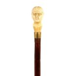 A 19TH CENTURY IVORY-HANDLED PHRENOLOGICAL WALKING STICK