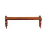 A WILLIAM IV MAHOGANY WINDOW BENCH IN THE MANNER OF GILLOWS
