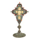 AN 18TH CENTURY GREEK JEWELLED AND ENAMELLED SILVER METAL CRUCIFIX WITH PANELLED IVORY CENTRE