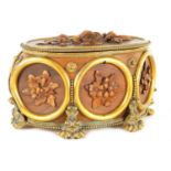 A FINELY CARVED 19TH CENTURY FRENCH OVAL ORMOLU MOUNTED JEWELLERY CASKET