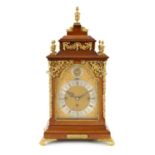 A LATE 19TH CENTURY ORMOLU MOUNTED MAHOGANY EIGHT BELL QUARTER CHIMING BRACKET CLOCK