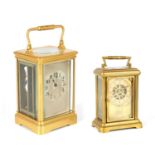 TWO LATE 19TH CENTURY AMERICAN BRASS STRIKING CARRIAGE CLOCKS