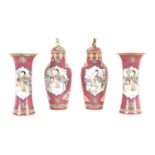 A 19TH CENTURY PORCELAIN FAMILLE ROSE GARNITURE SET