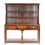 AN 18TH CENTURY SMALL JOINED OAK POT BOARD DRESSER OF FINE COLOUR AND PATINA