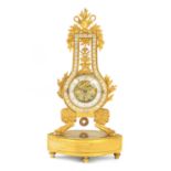 AN EARLY 19TH CENTURY FRENCH ORMOLU LIAR SHAPED MANTEL CLOCK