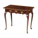 AN EARLY 18TH CENTURY FIGURED MAHOGANY SIDE TABLE