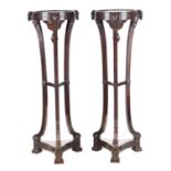 A PAIR OF EARLY 20TH CENTURY ADAM STYLE MAHOGANY TORCHERES