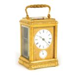 HOLLINGE. A 19TH CENTURY FRENCH GILT BRASS ENGRAVED GORGE CASE REPEATING CARRIAGE CLOCK