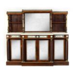 A FINE REGENCY ROSEWOOD AND ORMOLU MOUNTED BREAKFRONT SIDE CABINET SET WITH SERVES PANELS