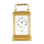 AN UNUSUAL LATE 19TH CENTURY GILT BRASS GRAND SONNERIE CARRIAGE CLOCK