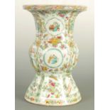 A LARGE CHINESE FAMILLE ROSE VASE WITH FLARD NECK AND BASE