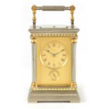 DROCOURT, PARIS. A LATE 19TH CENTURY FRENCH SILVERED AND GILT BRASS REPEATING CARRIAGE CLOCK