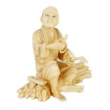 A LATE 19TH CENTURY MEIJI PERIOD CARVED IVORY FIGURE