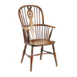 AN EARLY 19TH CENTURY ELM AND ASH THAMES VALLEY WINDSOR CHAIR