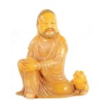 A 19TH CENTURY CHINESE CARVED SOAPSTONE FIGURE