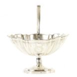 A LATE 19TH CENTURY SILVER SHELL SHAPED ADAM STYLE SUGAR BASKET