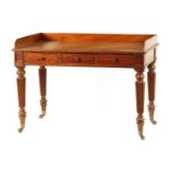 A GEORGE III MAHOGANY WRITING / WASH TABLE IN THE MANNER OF GILLOWS