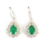 A FINE AND LARGE PAIR OF 18CT WHITE GOLD DIAMOND AND EMERALD EARRINGS