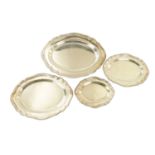 A SET OF FOUR REGENCY SILVER PLATE SCALLOP-EDGE OVAL SERVING DISHES BY MATTHEW BOULTON