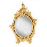 A 19TH CENTURY CARVED GILT GESSO ROCOCO STYLE HANGING MIRROR