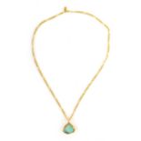 A FINE 9CT GOLD NECKLACE WITH FIRE OPAL PENDANT