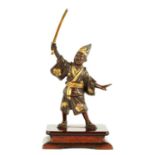 A MINIATURE JAPANESE MEIJI PERIOD PATINATED BRONZE AND GILT SCULPTURE BY MIYAO