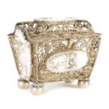 A 19TH CENTURY CONTINENTAL SILVER METAL FILIGREE WORK CASKET