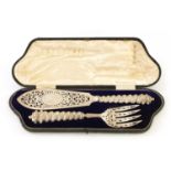 A FINE VICTORIAN CASED PAIR OF SILVER FISH SERVERS