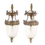 A PAIR OF EARLY 20TH CENTURY GILT BRASS HANGING LANTERNS