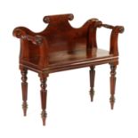 A REGENCY MAHOGANY HALL BENCH IN THE MANNER OF GILLOWS