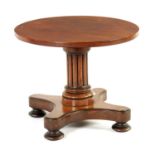 A 19TH CENTURY MAHOGANY ADJUSTABLE OCCASIONAL TABLE IN THE MANNER OF GILLOWS