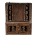 A LATE 17TH CENTURY OAK HANGING FOOD CUPBOARD