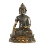 A 19TH CENTURY TIBETAN CAST BRONZE BUDDHA OF SMALL SIZE