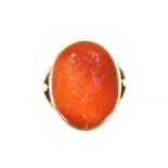 A LATE GEORGIAN 9CT GOLD CARNELIAN INTAGLIO SIGNET RING DEPICTING THE FAMOUS ASTRONOMER EDMOND HALLE
