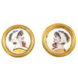 A PAIR OF GEORGE III CIRCULAR CONVEX ENAMEL PORTRAIT MEDALLIONS