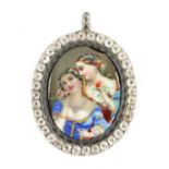 A 19TH CENTURY CONTINENTAL SILVER METAL PAINTED ENAMEL PORTRAIT PENDANT