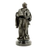 A 19TH CENTURY BRONZED CAST IRON FIGURE