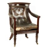 A LATE REGENCY MAHOGANY OPEN ARM LIBRARY CHAIR