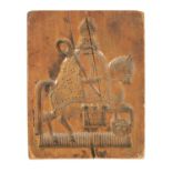 A 19TH CENTURY GINGERBREAD MOULD DEPICTING A BISHOP ON HORSEBACK