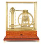 AN UNUSUAL 20TH CENTURY INDUSTRIAL BALL BEARING WATERWHEEL CLOCK