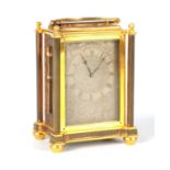 A FINE MID 19TH CENTURY ENGLISH ENGRAVED GILT BRASS FUSEE CARRIAGE CLOCK