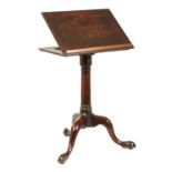 A GEORGE II MAHOGANY ADJUSTABLE READING TABLE