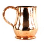 A GEORGIAN GIANT SIZE COPPER ALE JUG