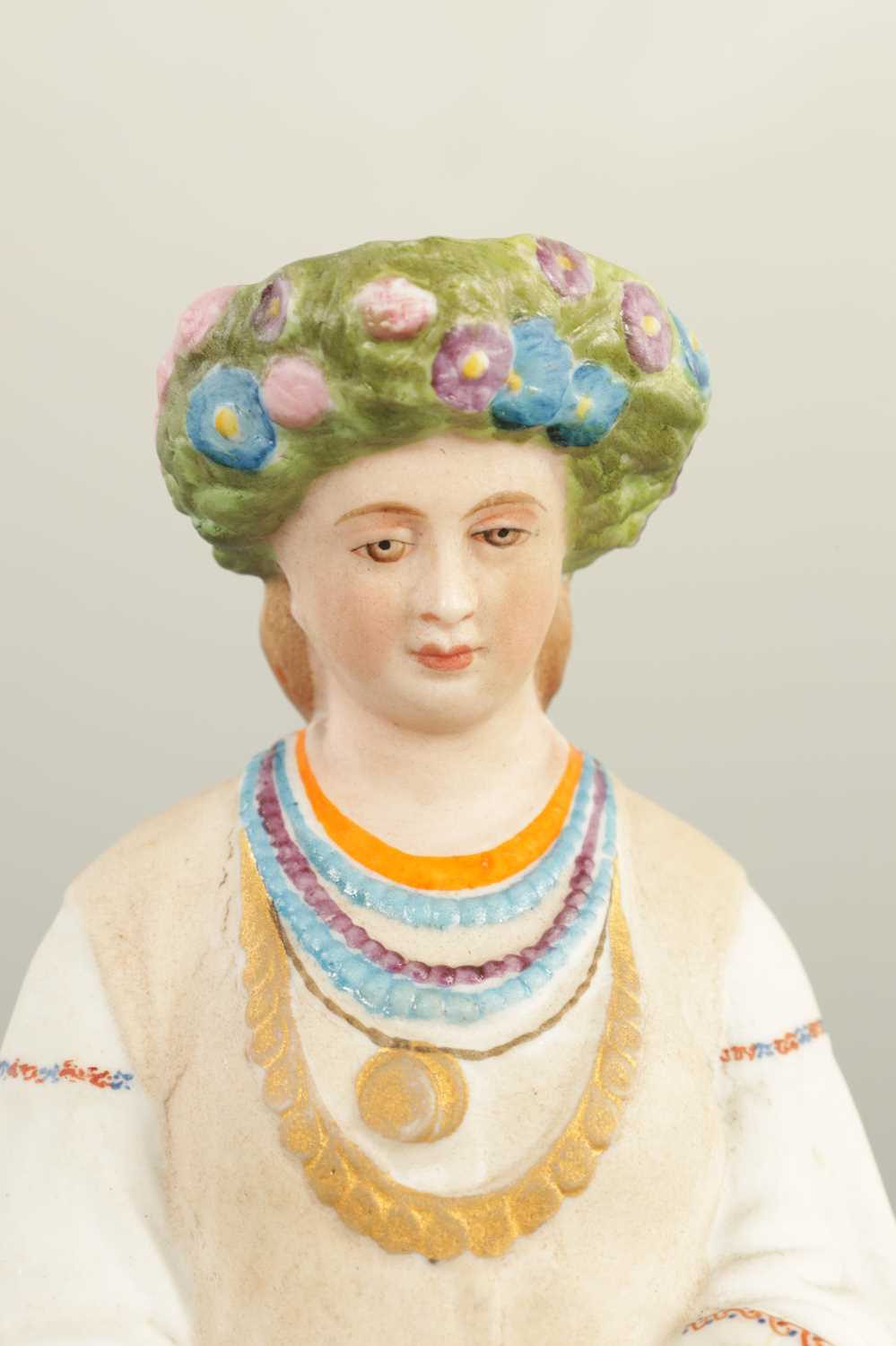 AN EARLY 20TH CENTURY RUSSIAN STANDING BISQUE FIGURE OF A FLOWER GIRL - Image 2 of 11