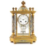 A LATE 19TH CENTURY FRENCH ORMOLU AND CHAMPLEVE ENAMEL MANTEL CLOCK