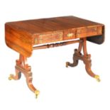 A REGENCY BRASS MOUNTED FIGURED ROSEWOOD SOFA TABLE